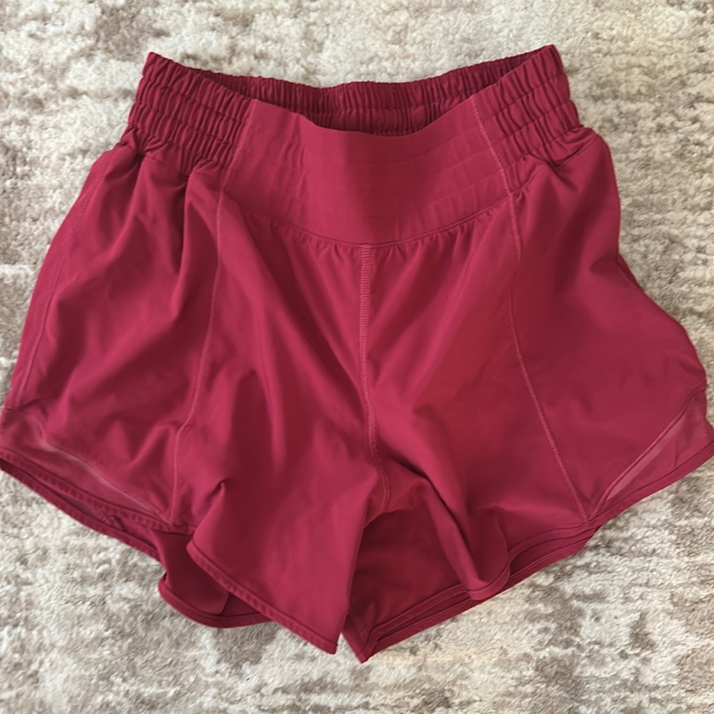 lululemon athletica Magenta Smoke Hotty Hot High-Rise Shorts 4" - Picture 2 of 3